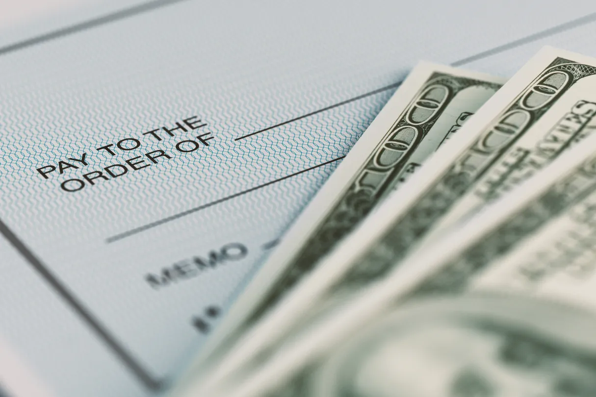 bills of money and checks for employees - avoid payroll mistakes