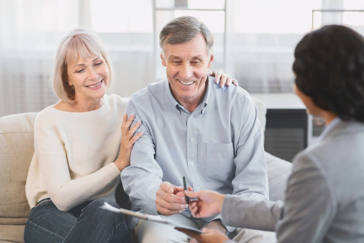 estate accountant explaining to the senior couple about the new AB 2016 guidelines