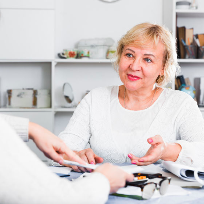 What is Trust Accounting for a Trust? A woman smiling and talking to someone, explaining the answer to the question, What is Trust Accounting for a Trust?