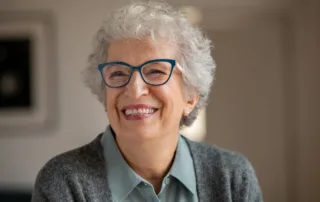 Happy seniors after their kids hired a private fiduciary for the elderly to help manage their finances. Elder care services with Marcia Campbell.