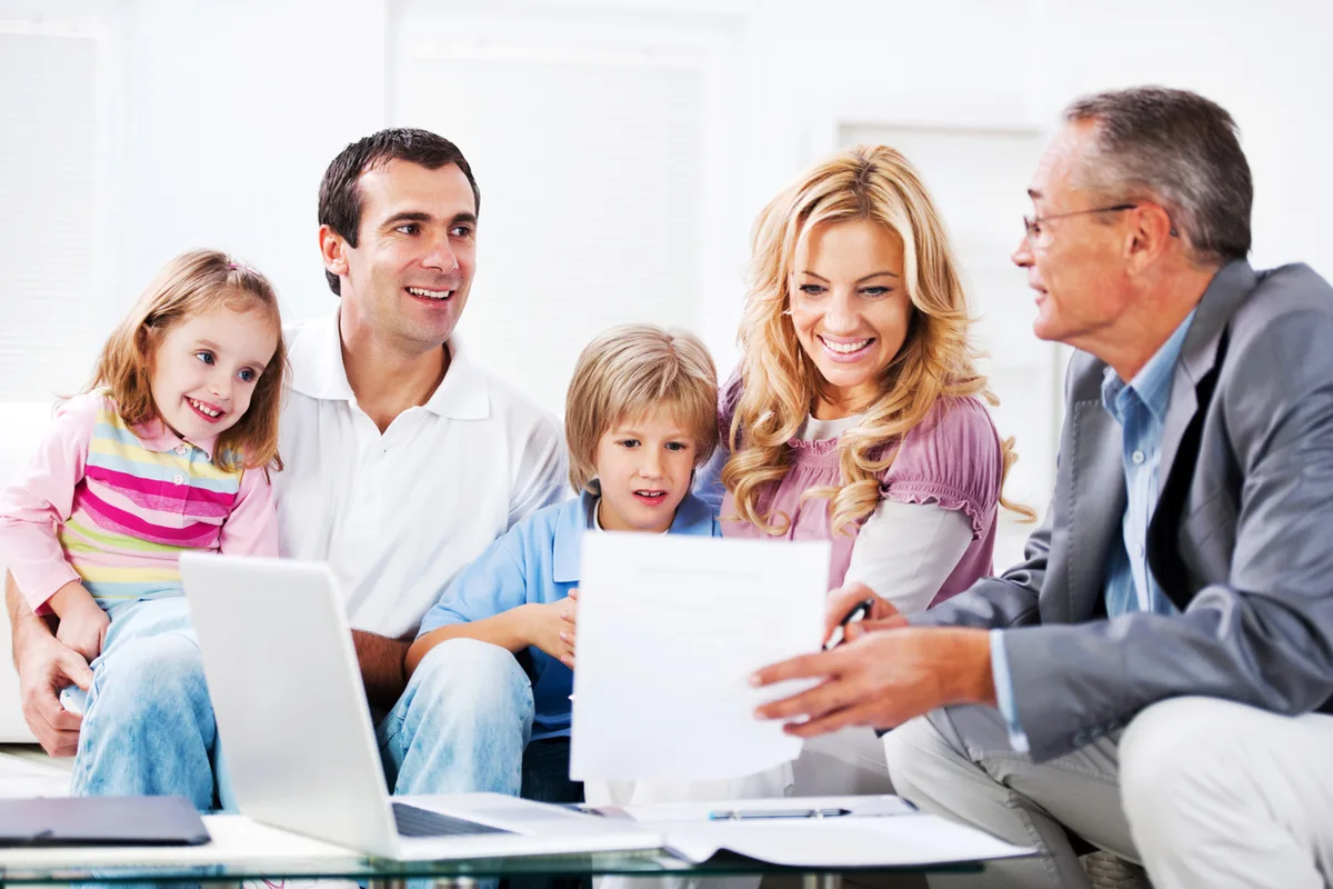 Family meeting with an advisor reviewing California trust documents and beneficiary rights