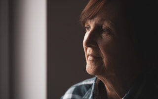 A person with dementia who would benefit from trustee services in California to manage their finances