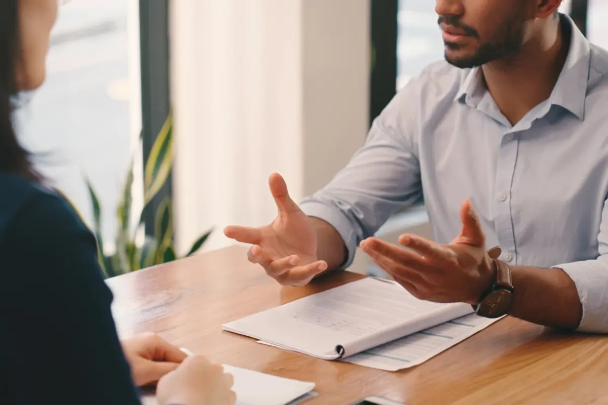 Advisor explains A Beginner’s Guide to Trusts and Trust Accounting during a calm office consultation