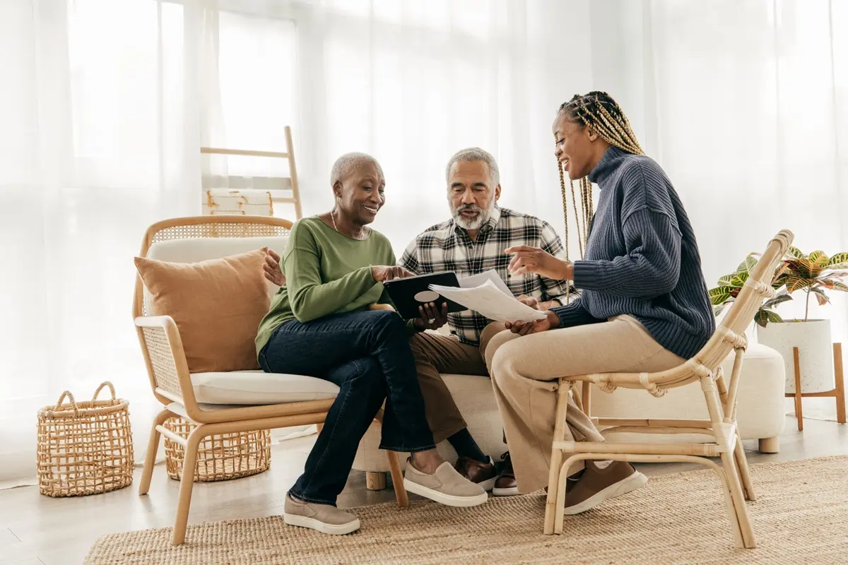 Person reviewing finances on a laptop, learning What Are the Three Duties of a Fiduciary for better decisions