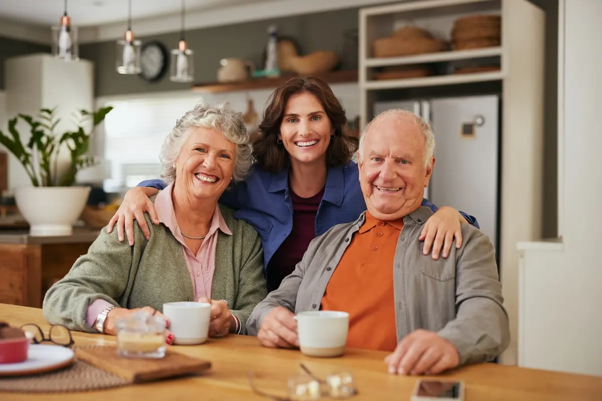 Adult daughter with older parents, illustrating How to Discuss Your Parents Finances