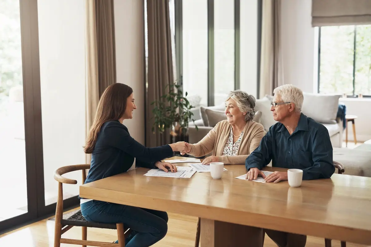 A professional fiduciary shaking hands