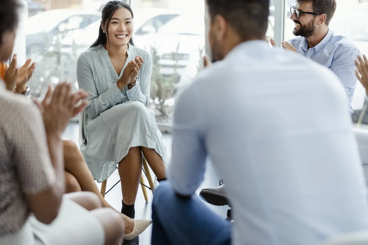 how a trust can protect assets A professional raises his arms in a moment of achievement, reflecting the financial security and peace of mind on how a trust can protect assets for vulnerable loved ones.