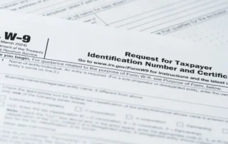 Close-up image of a W-9 tax form used for taxpayer identification and certification.